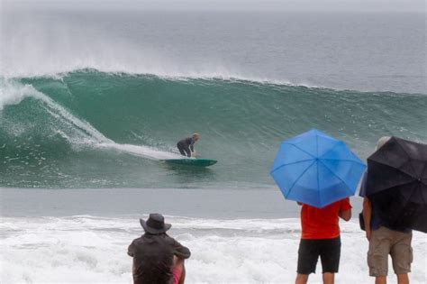 Surfers chase down tropical swell from Hurricane Hilary
